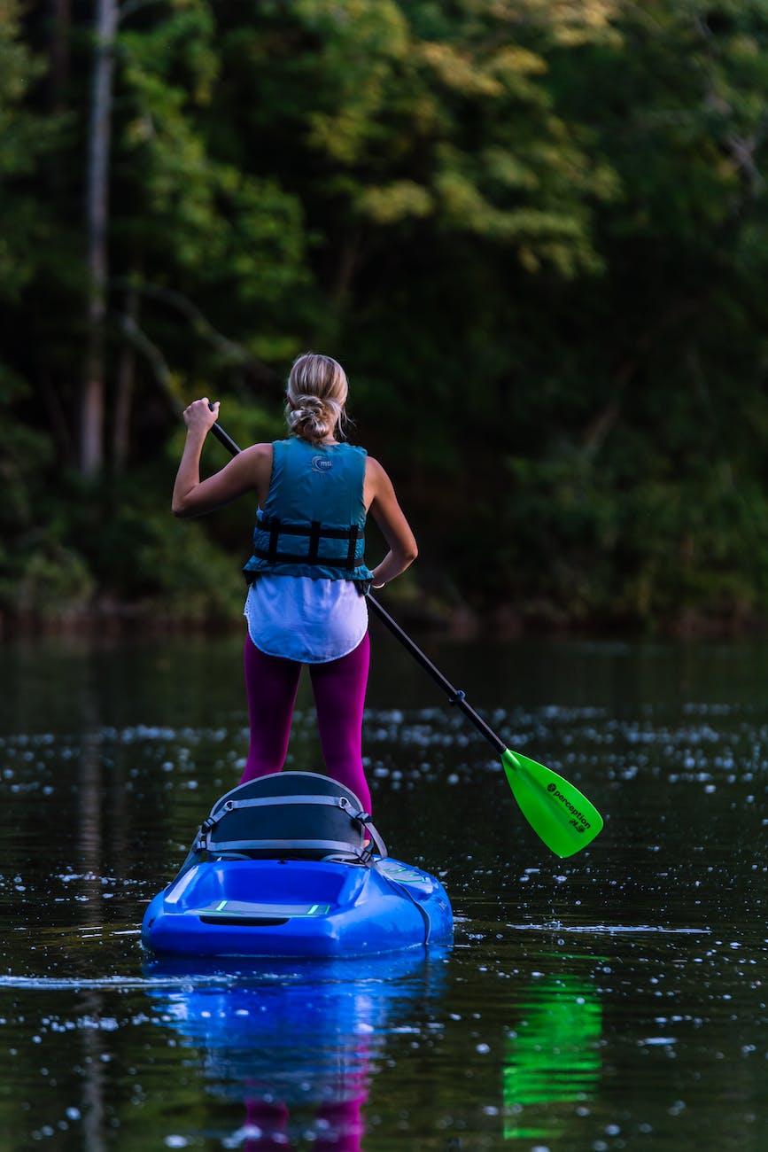 photo of a woman kayaking