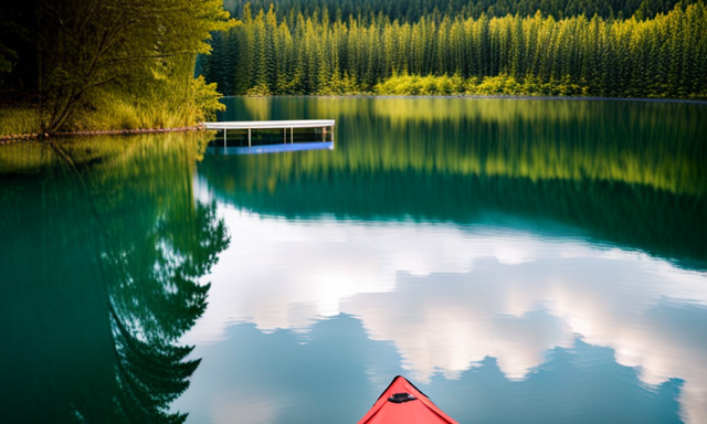 An image showcasing a wooden dock stretching over a serene lake, with a vibrant red canoe resting on its surface